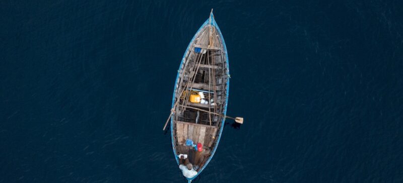 A small boat alone in the ocean