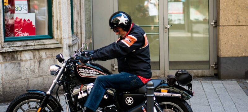 old man on a Harley Davidson motorcycle
