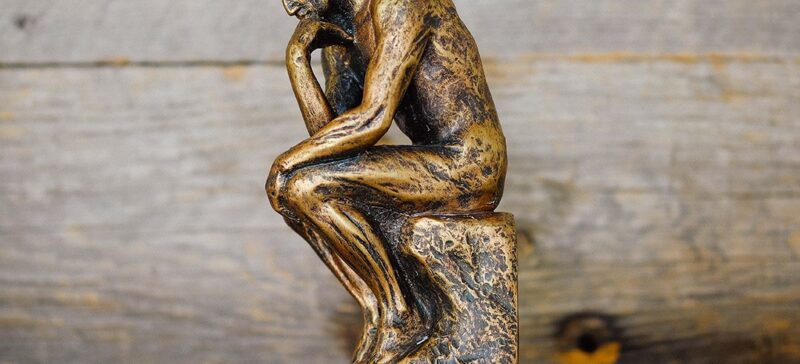 Statue of thinking man