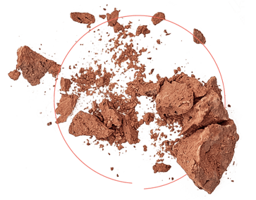 broken-decay-rock Shattered pieces from a larger red rock